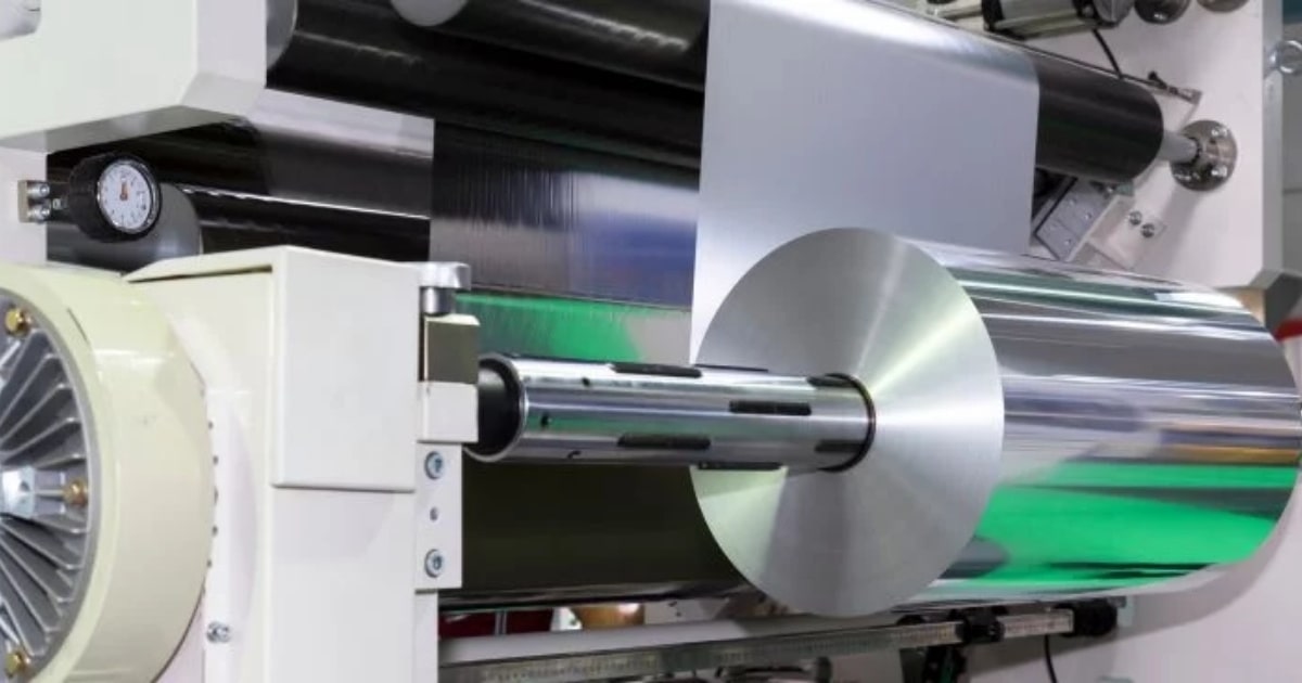High-precision aluminium foil rolling machine producing reflective foil at an advanced manufacturing facility.